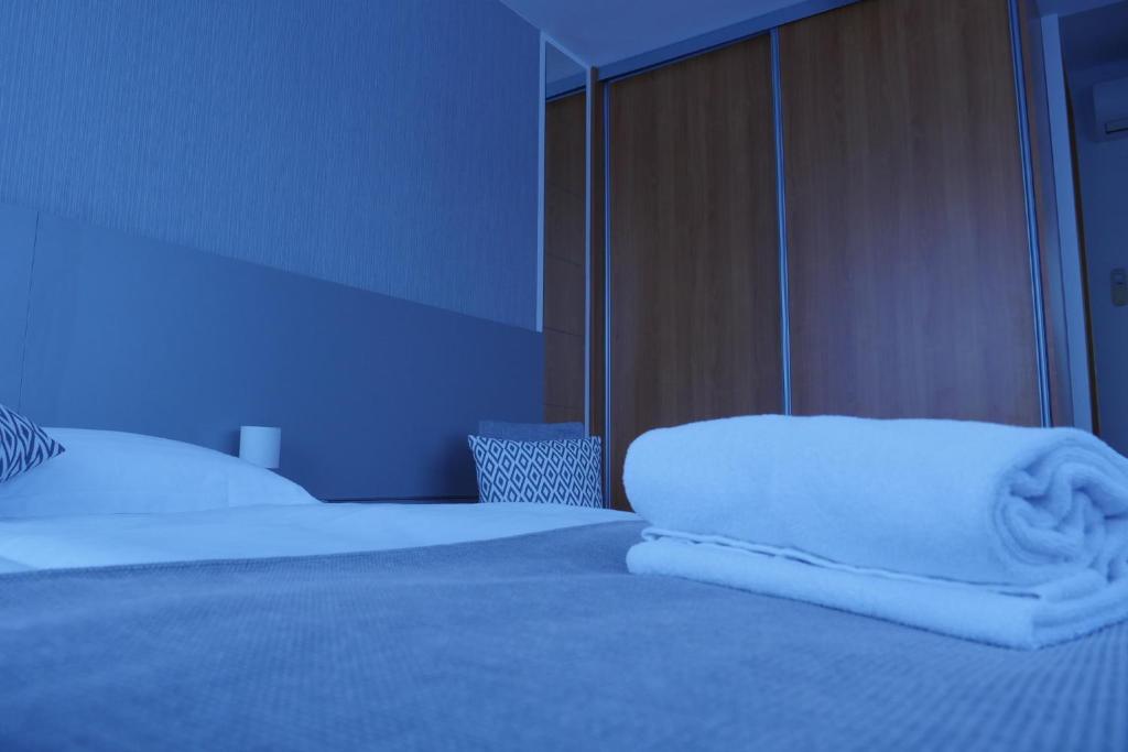 Postel nebo postele na pokoji v ubytování Sobe Rooms Nataly