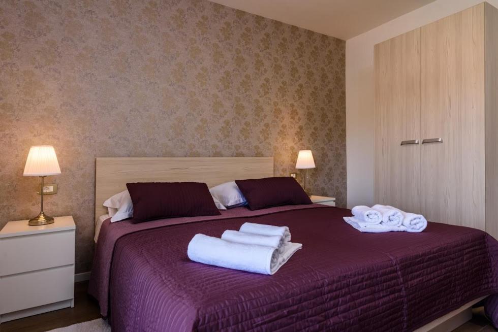 Posteľ alebo postele v izbe v ubytovaní Apartmani Marko i Ana