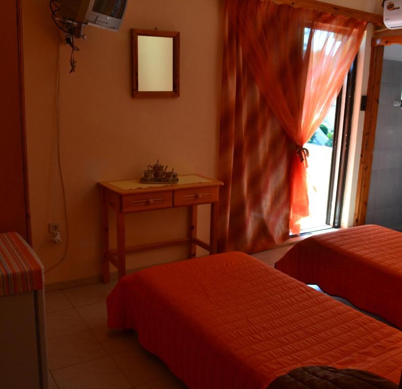 A bed or beds in a room at Noufaro studios