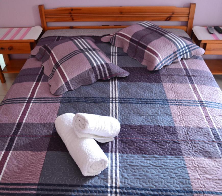 A bed or beds in a room at Noufaro studios