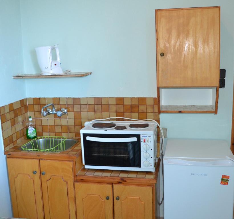 A kitchen or kitchenette at Noufaro studios