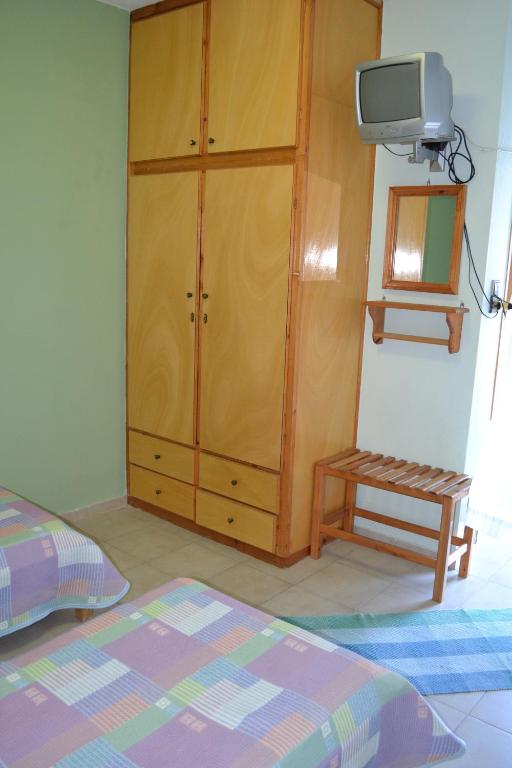 A bed or beds in a room at Noufaro studios