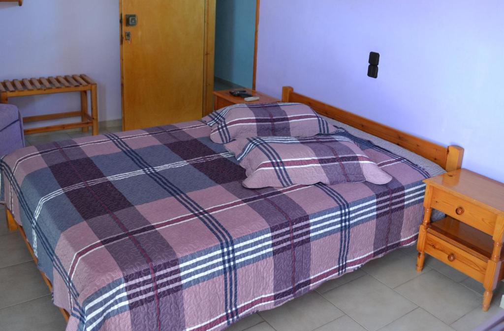 A bed or beds in a room at Noufaro studios