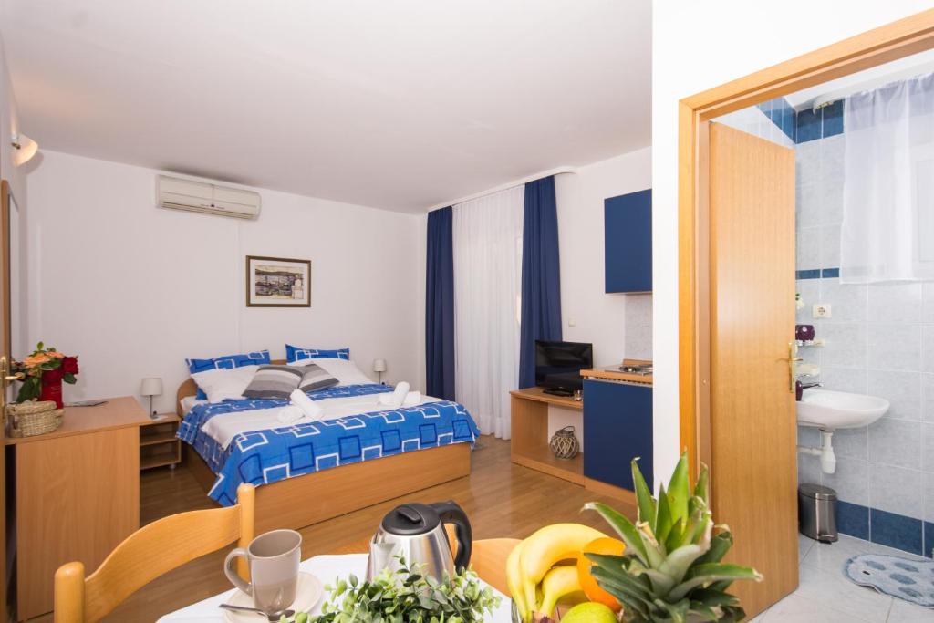 Posteľ alebo postele v izbe v ubytovaní Marko Apartments