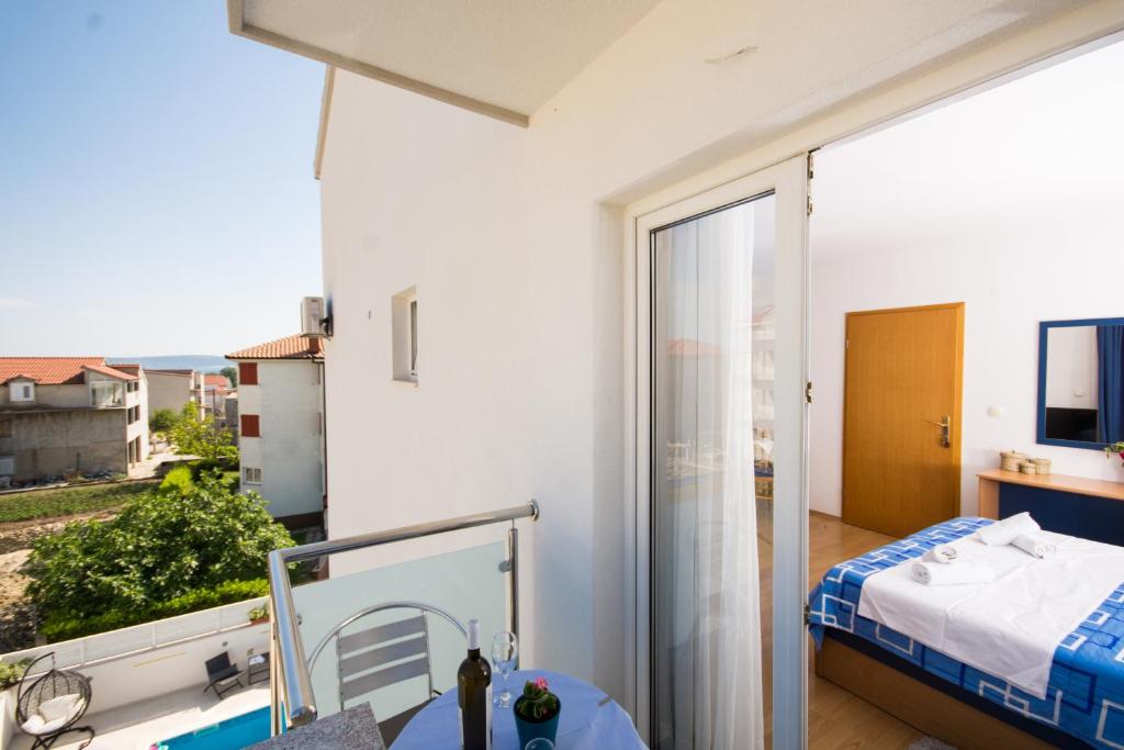 Posteľ alebo postele v izbe v ubytovaní Marko Apartments