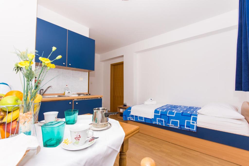 Posteľ alebo postele v izbe v ubytovaní Marko Apartments