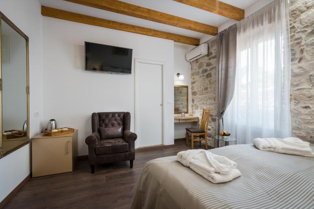 Posteľ alebo postele v izbe v ubytovaní ID Regal Residence