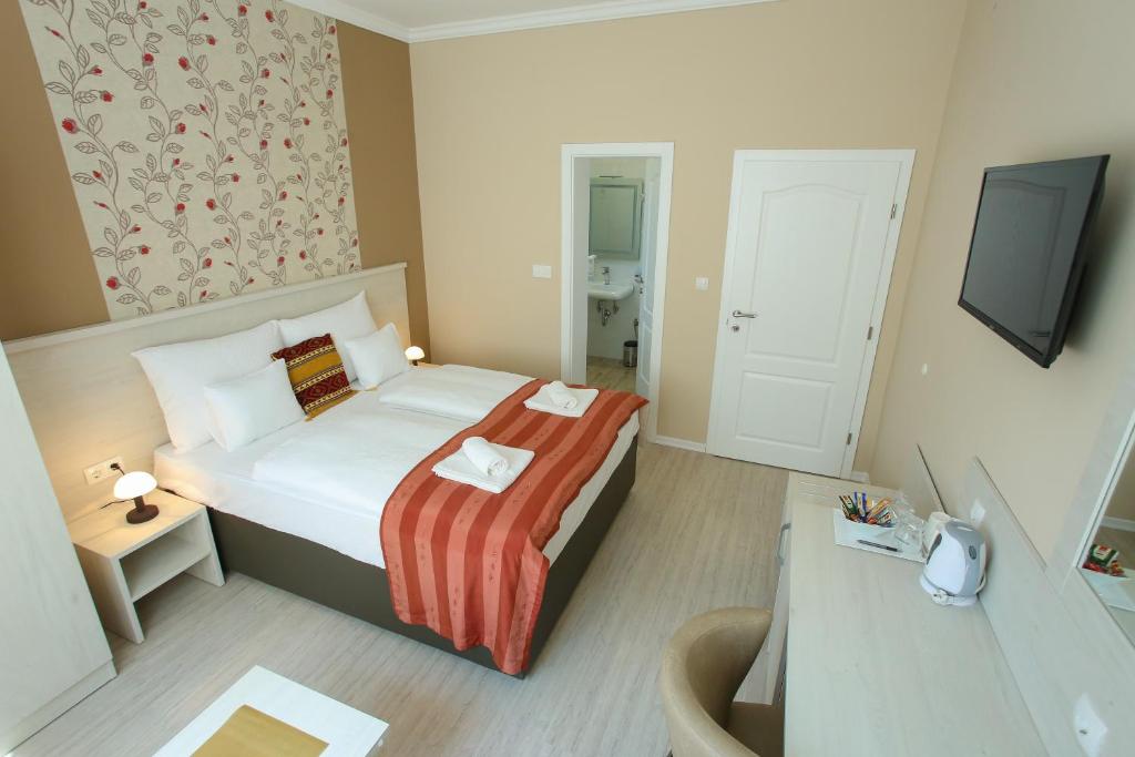Postel nebo postele na pokoji v ubytování Villa Prestige