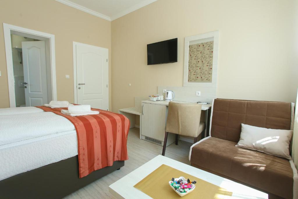 Postel nebo postele na pokoji v ubytování Villa Prestige