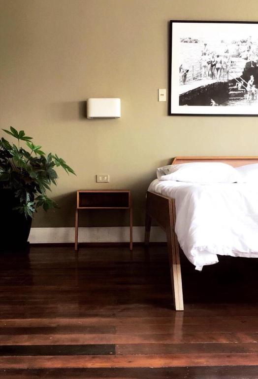 Postel nebo postele na pokoji v ubytování El Navegante B&B