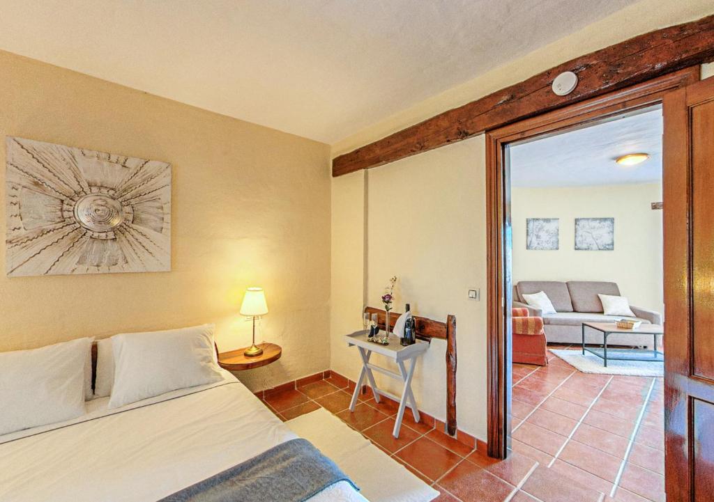 A bed or beds in a room at Apartamentos Rurales Islas Canarias
