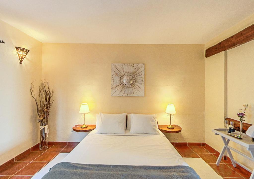 A bed or beds in a room at Apartamentos Rurales Islas Canarias