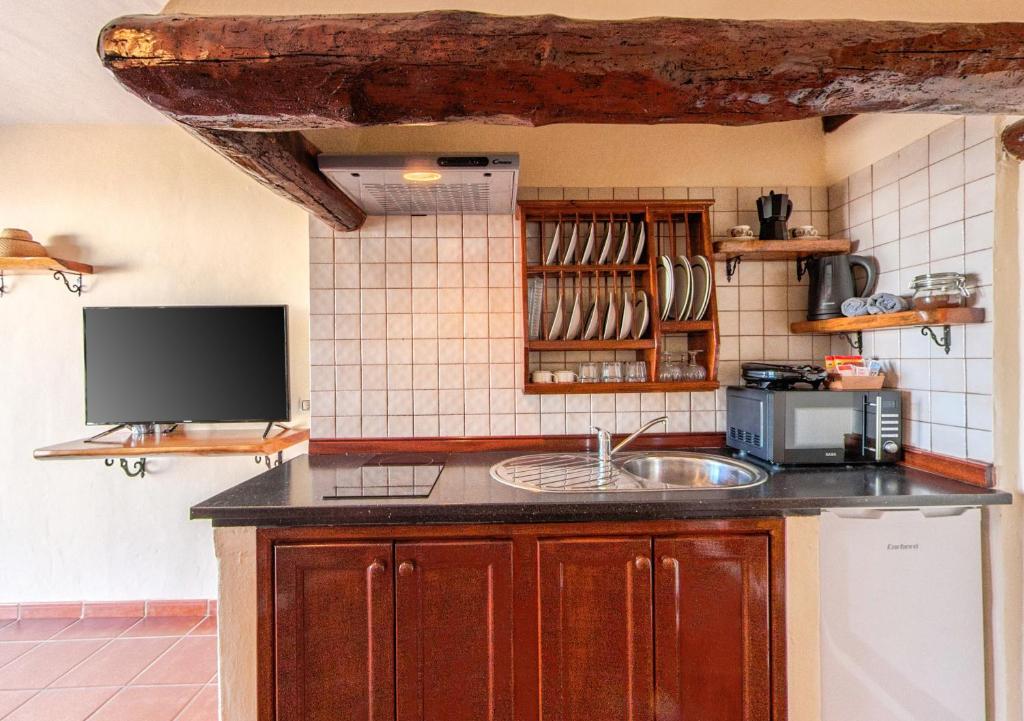 A kitchen or kitchenette at Apartamentos Rurales Islas Canarias