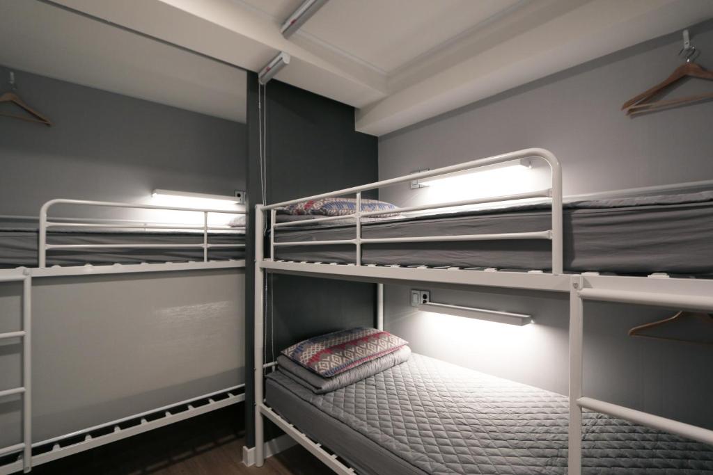 Palanda nebo palandy na pokoji v ubytování Blueboat Hostel Haeundae