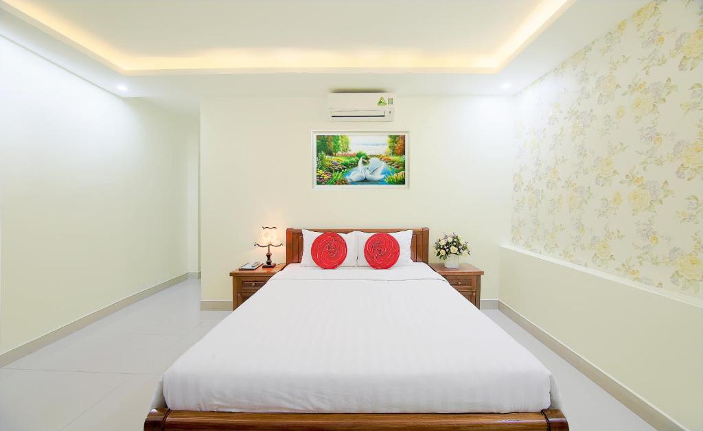 Postel nebo postele na pokoji v ubytování Sen Vang Hotel