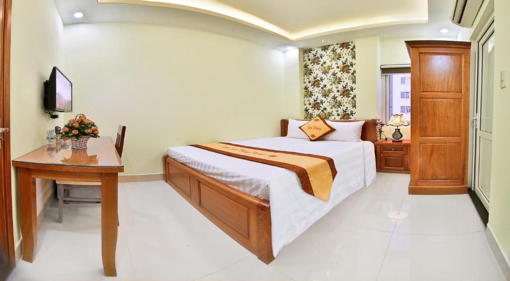 Postel nebo postele na pokoji v ubytování Sen Vang Hotel