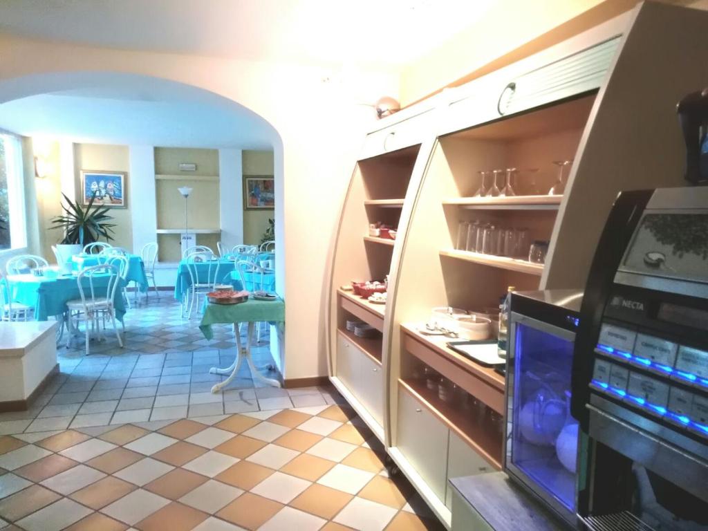 Kuchyň nebo kuchyňský kout v ubytování Elba Hotel