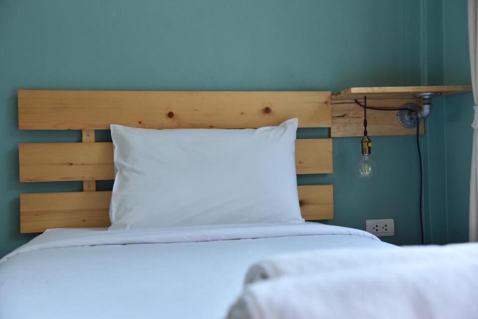 Postel nebo postele na pokoji v ubytování Rest Time Hotel