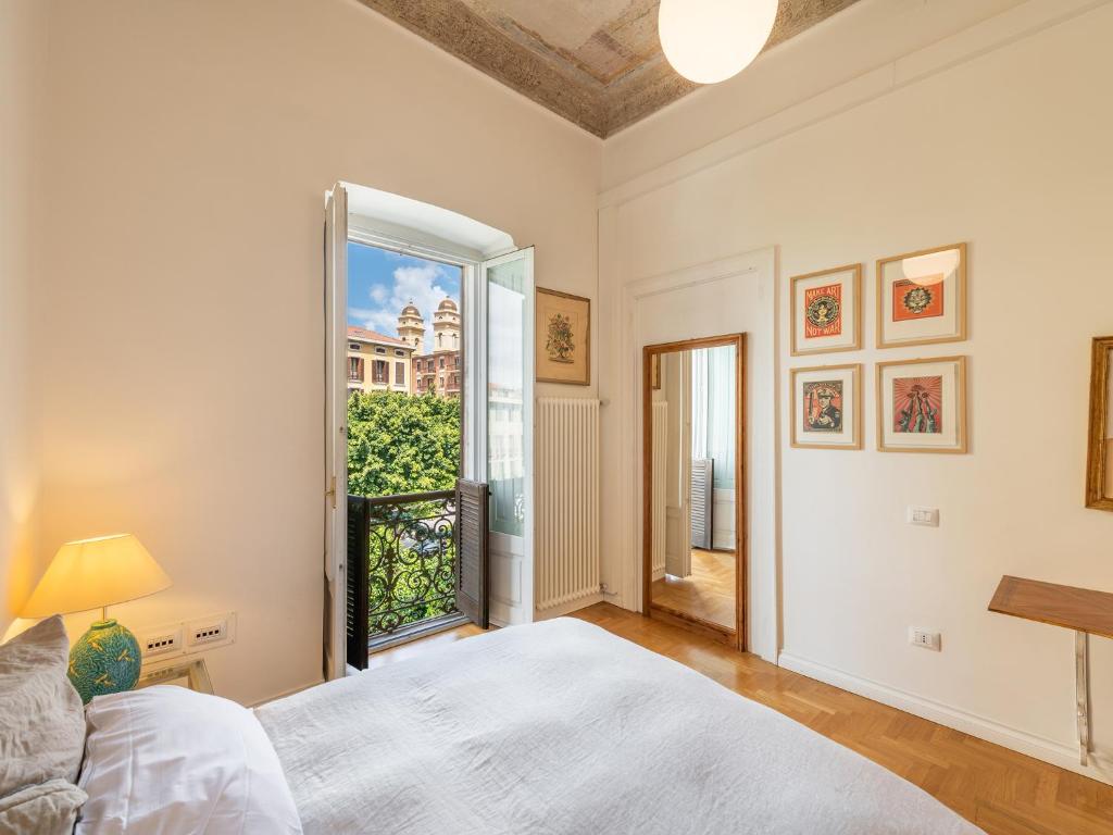 Säng eller sängar i ett rum på Sardinia Home Design