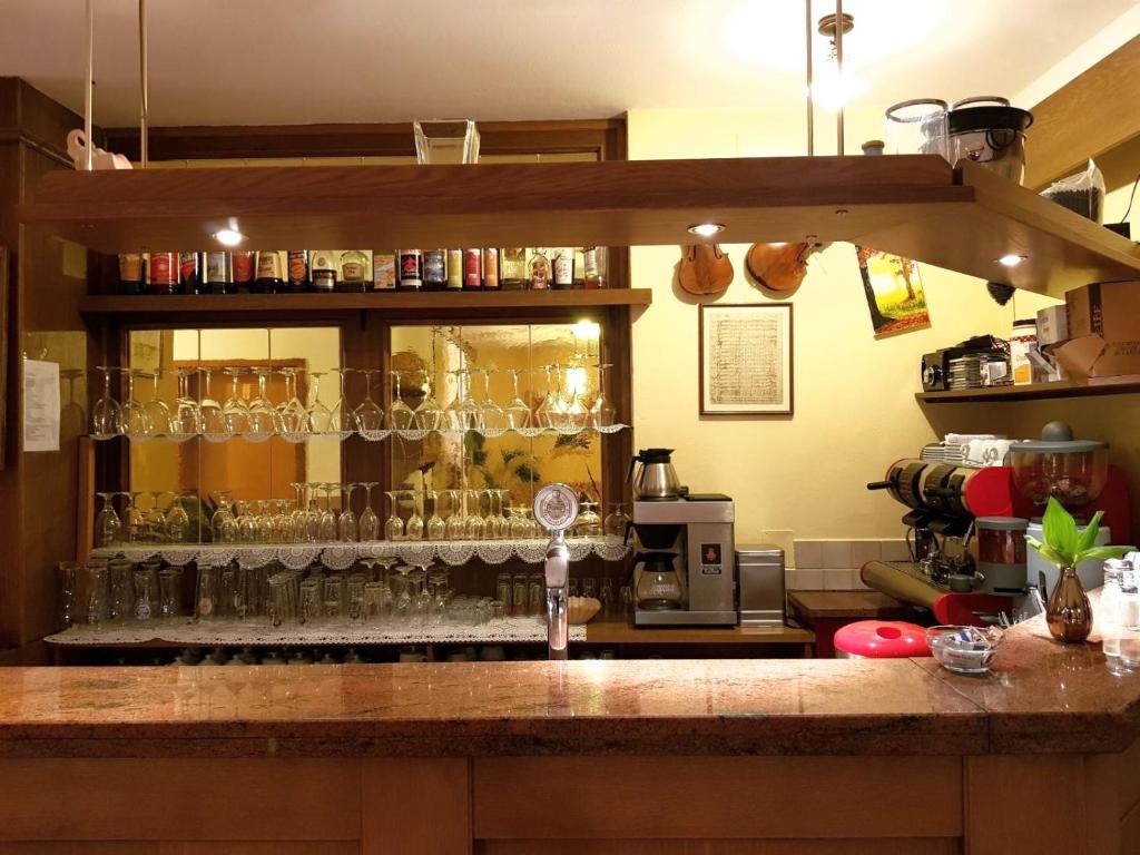 Lounge nebo bar v ubytování Hotel Pension Schweitzer