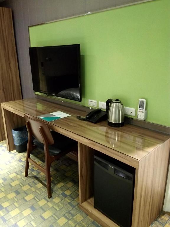 TV a/nebo společenská místnost v ubytování Ximen Hotel B