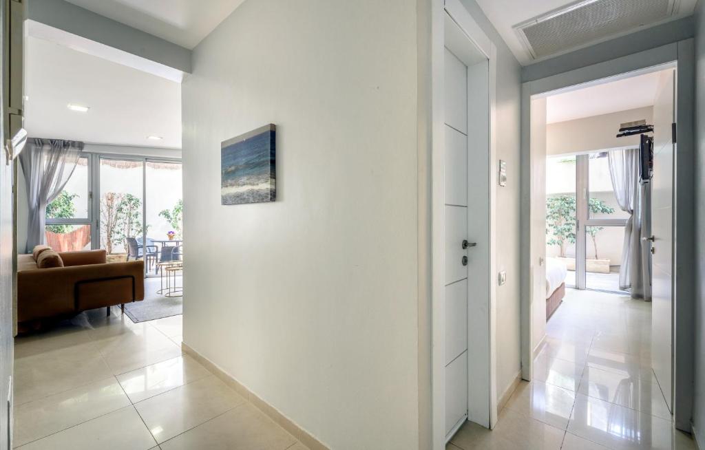 TV a/nebo společenská místnost v ubytování Sea Land Suites