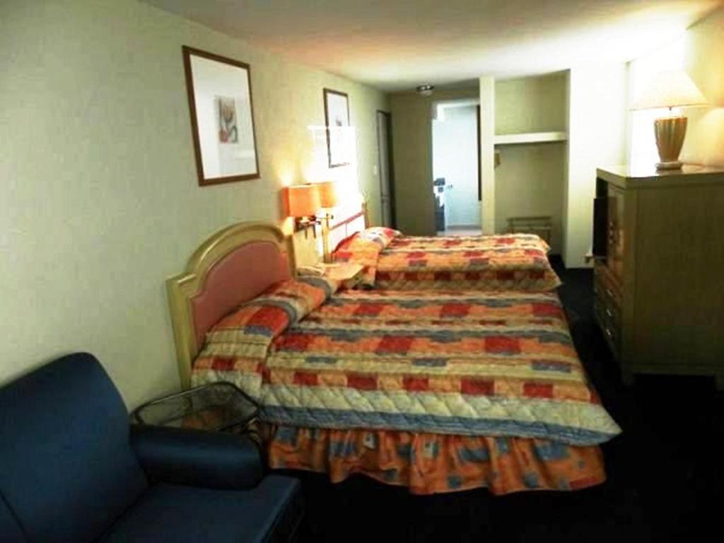 Cama o camas de una habitación en Hotel San Francisco Irapuato Business Class