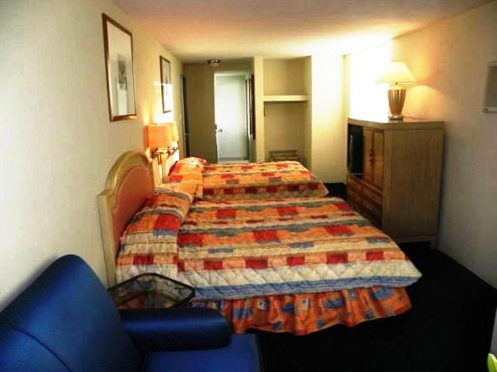 Cama o camas de una habitación en Hotel San Francisco Irapuato Business Class