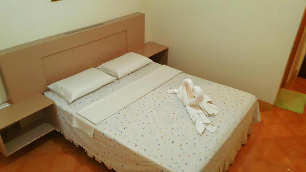 Posteľ alebo postele v izbe v ubytovaní Oslob Malonzo Pension House