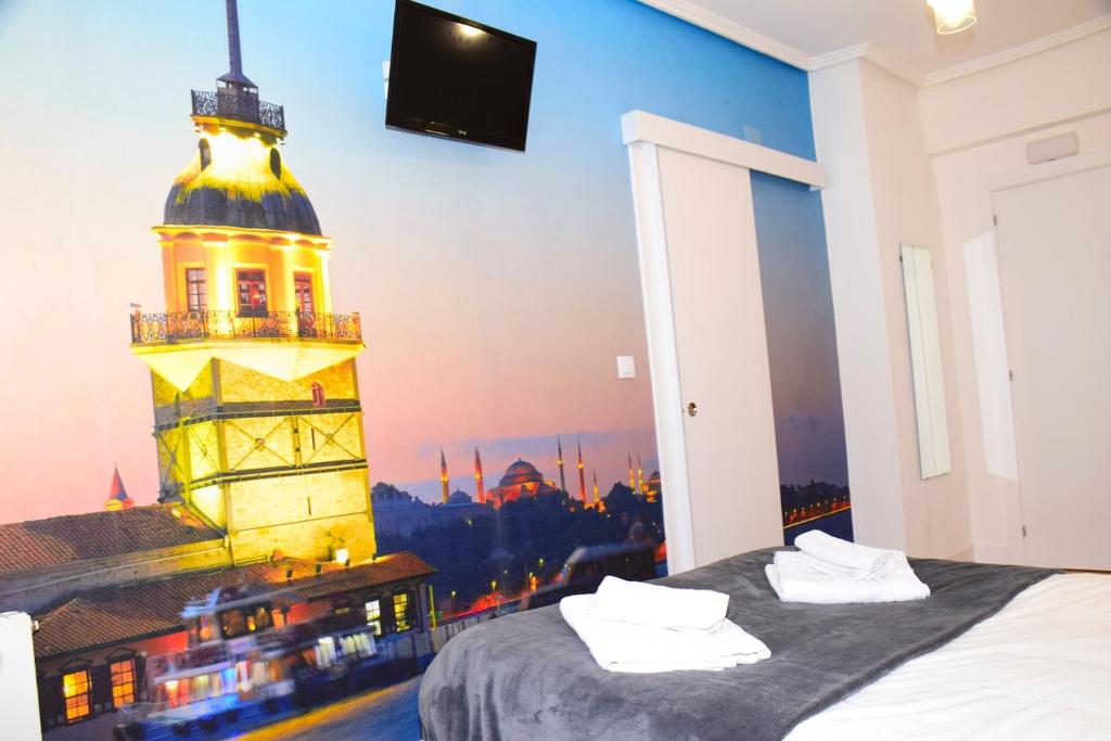 Postel nebo postele na pokoji v ubytování Maite Urban Dreams