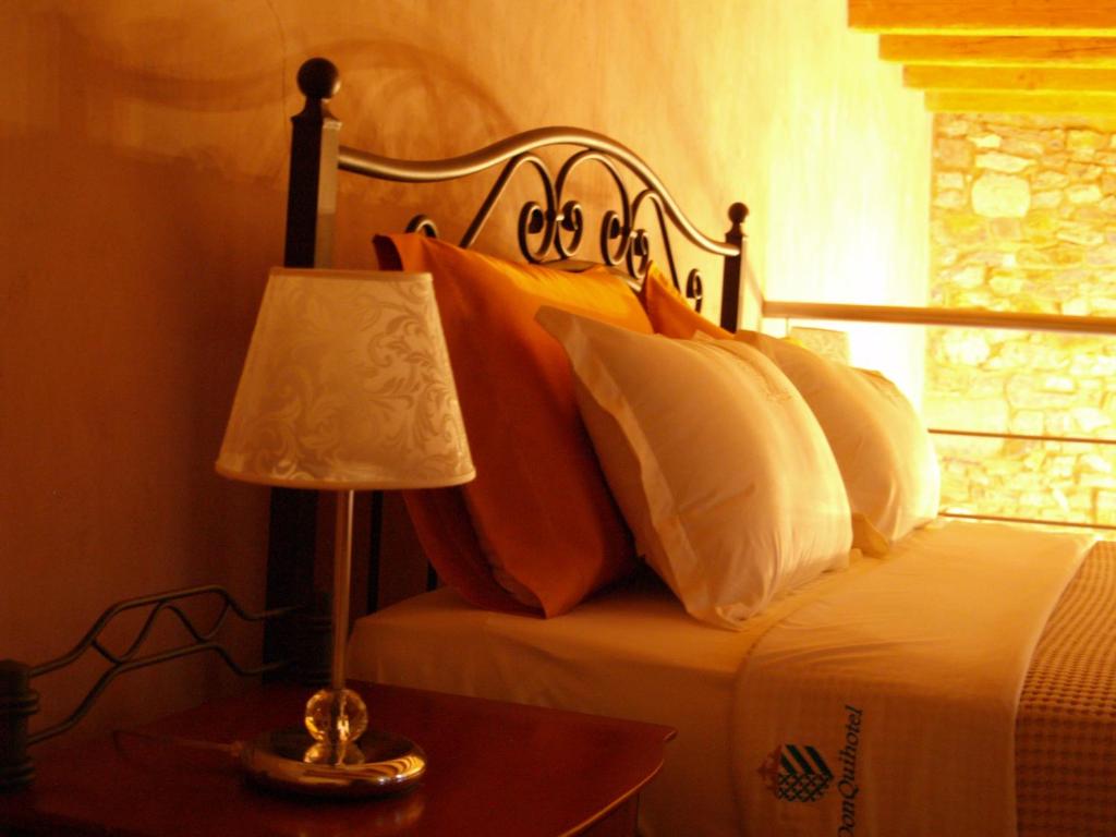 Postel nebo postele na pokoji v ubytování DonQuihotel Chalet