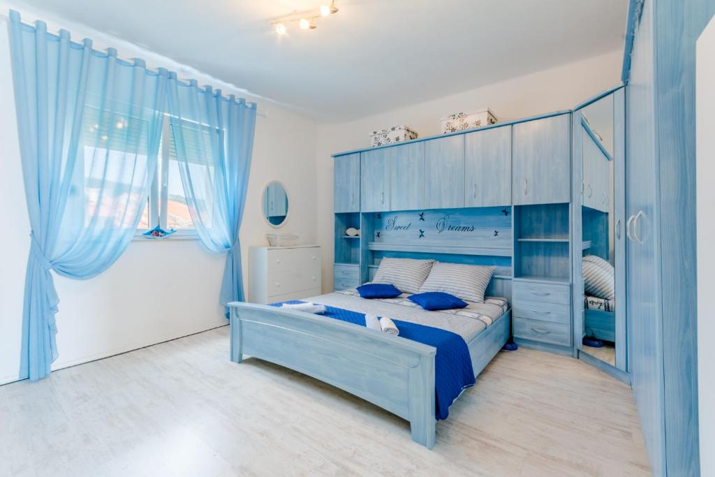 Кровать или кровати в номере Apartment Nazor