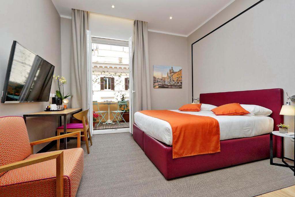 Cama ou camas em um quarto em Relais Vittoria Colonna