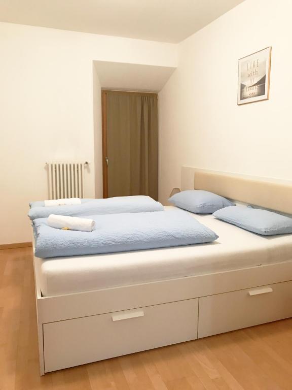 Łóżko lub łóżka w pokoju w obiekcie Argentieri Guesthouse