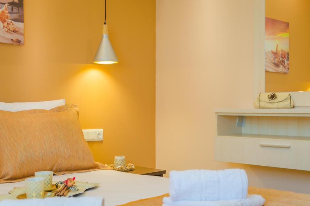 Postel nebo postele na pokoji v ubytování GiRene Apartments