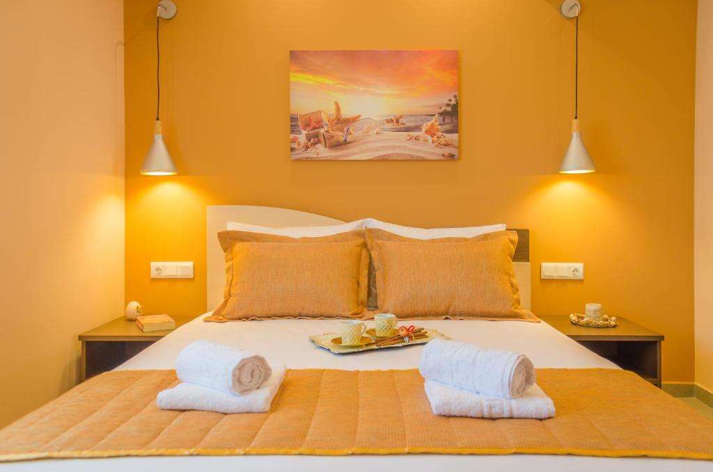 Postel nebo postele na pokoji v ubytování GiRene Apartments