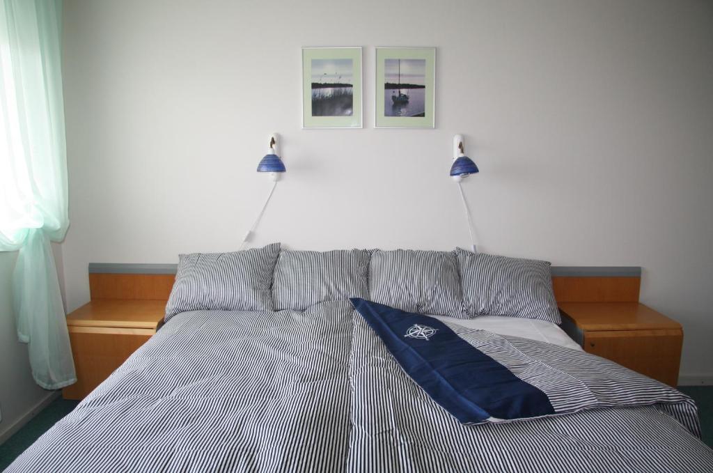 Postel nebo postele na pokoji v ubytování Heltermaa Hostel