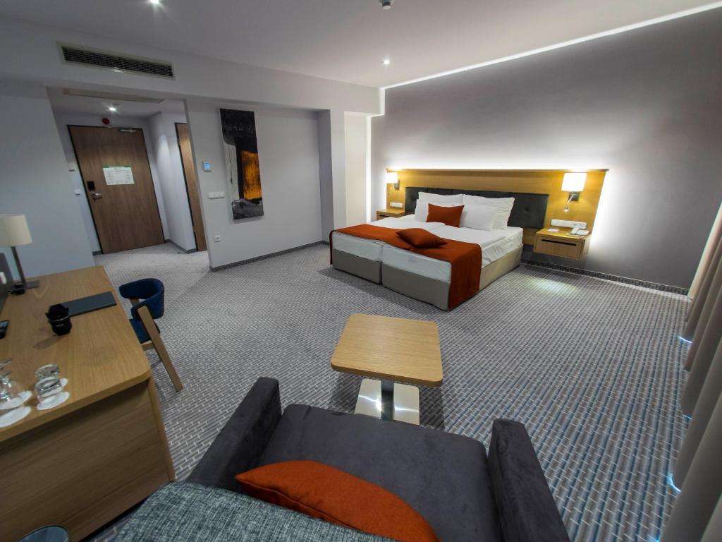 Postel nebo postele na pokoji v ubytování Thermal Hotel Balance Lenti