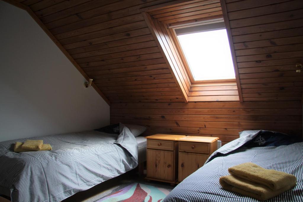 Postel nebo postele na pokoji v ubytování Heltermaa Hostel