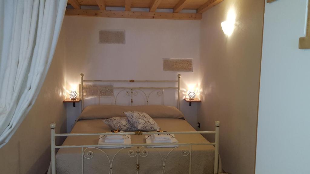 Postel nebo postele na pokoji v ubytování Torres Suite