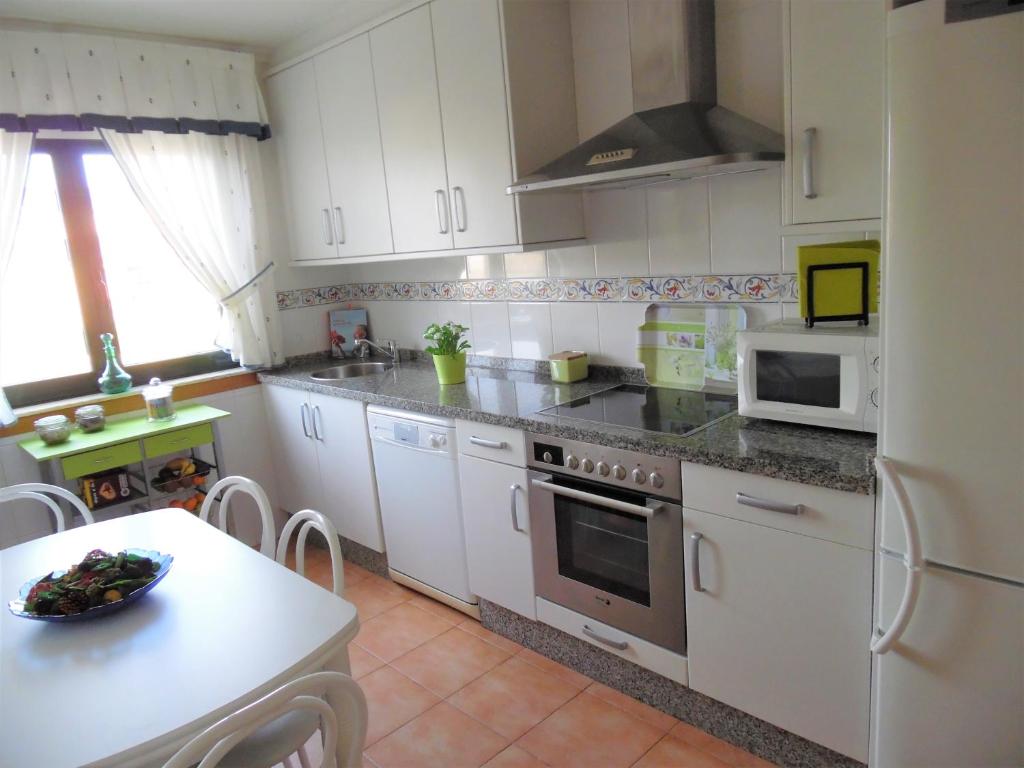 A kitchen or kitchenette at Playa de Altar Barreiros