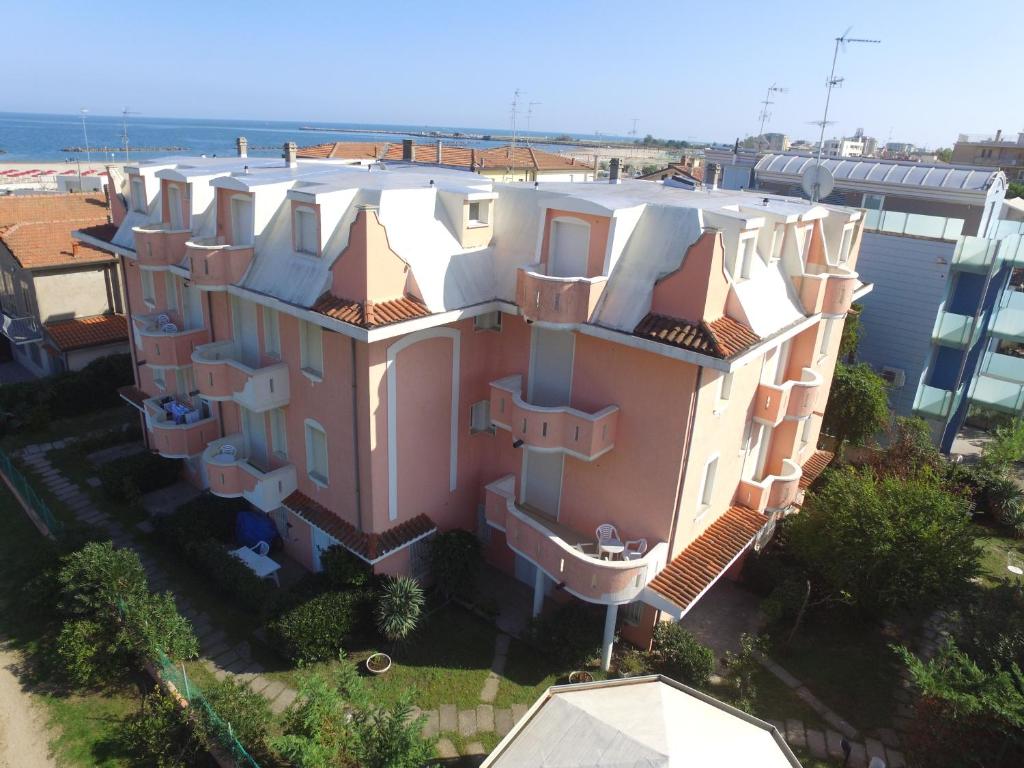 an aerial view of a building near the beach at Appartamenti Doria II in Porto Garibaldi