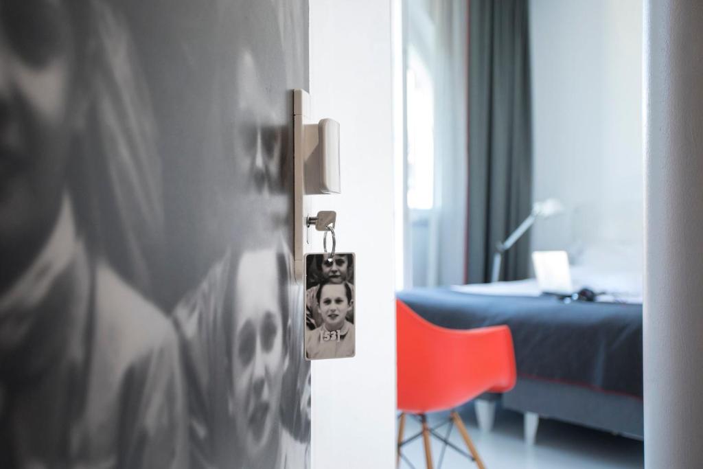 Postel nebo postele na pokoji v ubytování Collège Hôtel