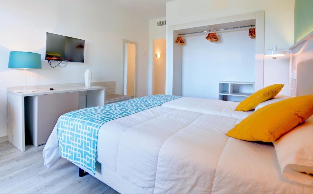 Postel nebo postele na pokoji v ubytování SBH Maxorata Resort