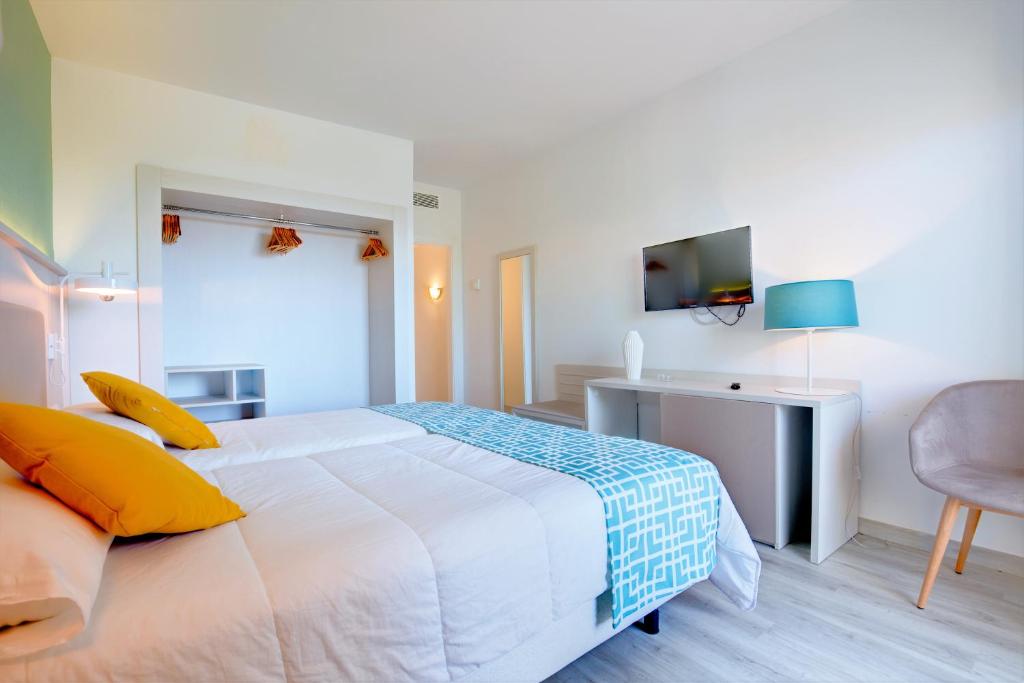 Postel nebo postele na pokoji v ubytování SBH Maxorata Resort