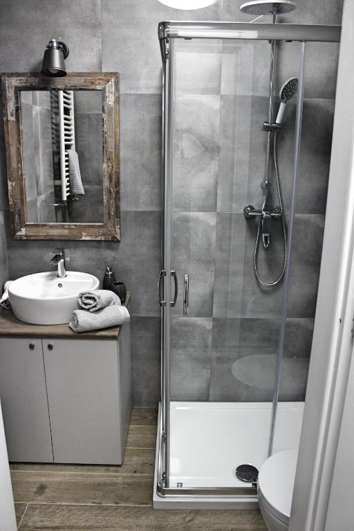 Kúpeľňa v ubytovaní Apartamenty EverySky - Osiedle Podgórze 1D