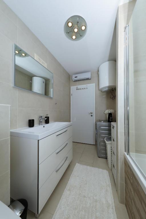 Kuchyňa alebo kuchynka v ubytovaní Luxury Apartman Rita, Center