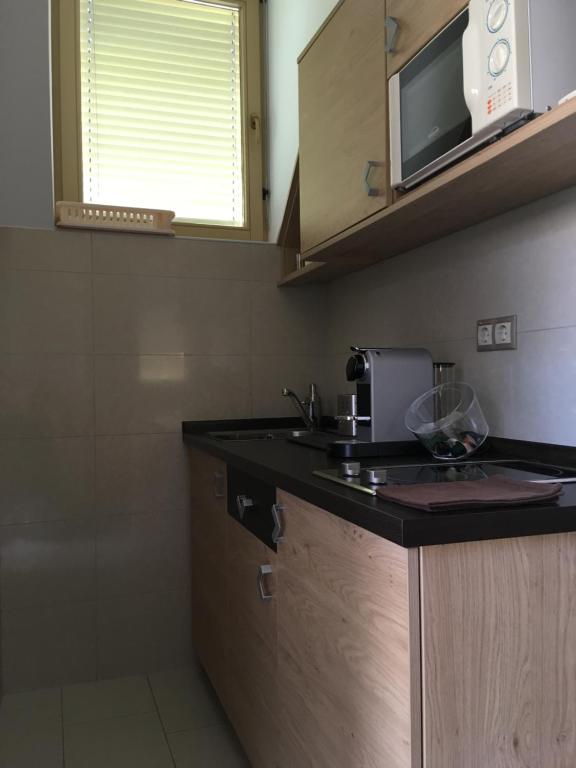Kuchyňa alebo kuchynka v ubytovaní Sétány Apartman