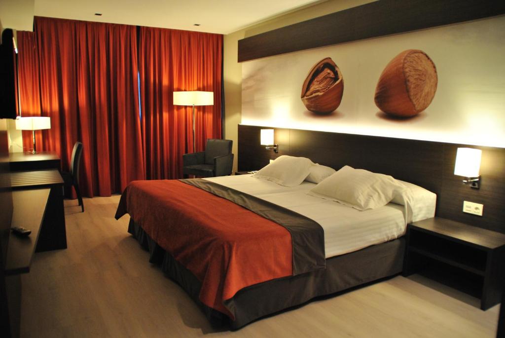 Postel nebo postele na pokoji v ubytování Brea's Hotel