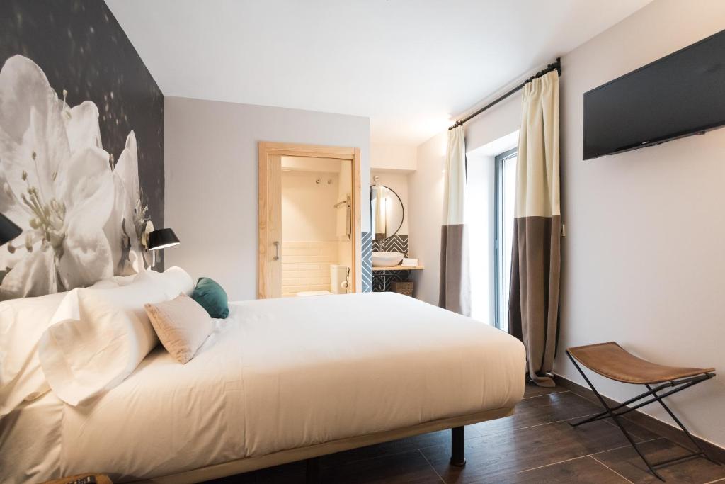 Postel nebo postele na pokoji v ubytování Hotel Rural Sagarlore